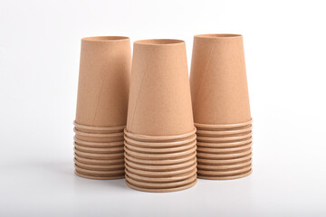 A stack of disposable coffee cups isolated on a white background. Paper cup, Takeaway paper coffee cup
