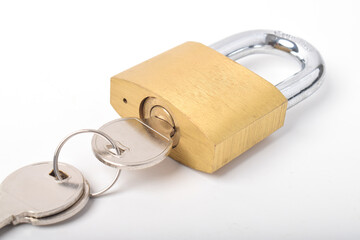 Steel padlock and keys isolated on white background
