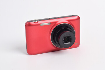 Red Digital Camera isolated on white background. Compact digital camera