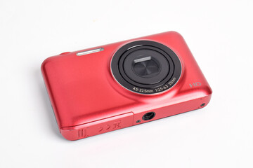 Red Digital Camera isolated on white background. Compact digital camera