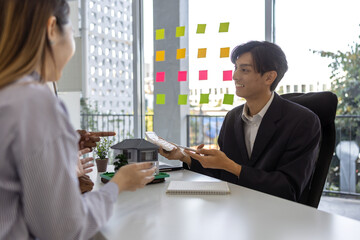 concept for selling a house and home insurance. Signing a house purchase and sale agreement, housing rental, mortgage, real estate, rent, selling, loan, property, agent