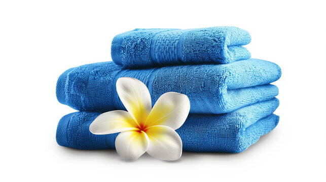 A stack of blue towels with a yellow flower on top. The towels are neatly folded and stacked on top of each other. Concept of cleanliness and organization