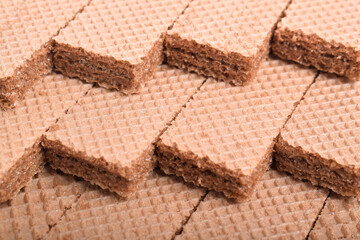 Chocolate wafers background. Diagonal arrangement with close up view