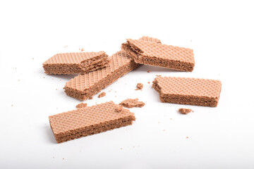 Chocolate wafer with crumbs isolated on white background.