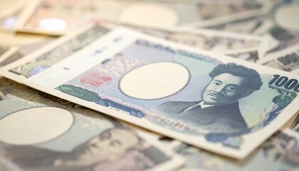 Japanese Yen banknotes, illustrating the concept of finance, savings, and currency