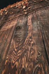 Close up texture and pattern weathered wooden wall the planks, a part of an outdoor structure building