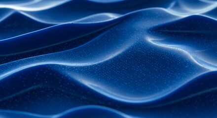 Abstract blue waves create a textured, fluid surface with subtle light and shadow effects, forming dynamic forms