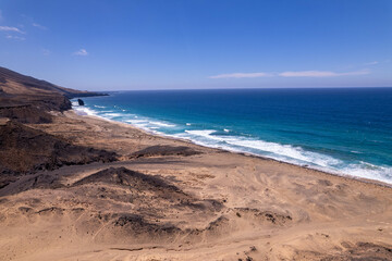 Aerial view of coastal cliffs near Roque del Moro, Fuerteventura