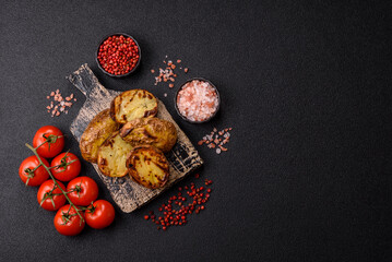Food, potatoes cut in halves or slices grilled. Cooked baked potatoes