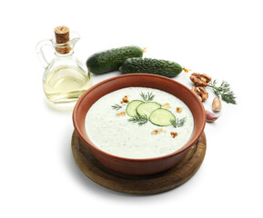 Tasty cucumber soup with dill, walnuts and ingredients isolated on white
