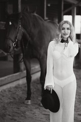 young woman in a dress with a horse