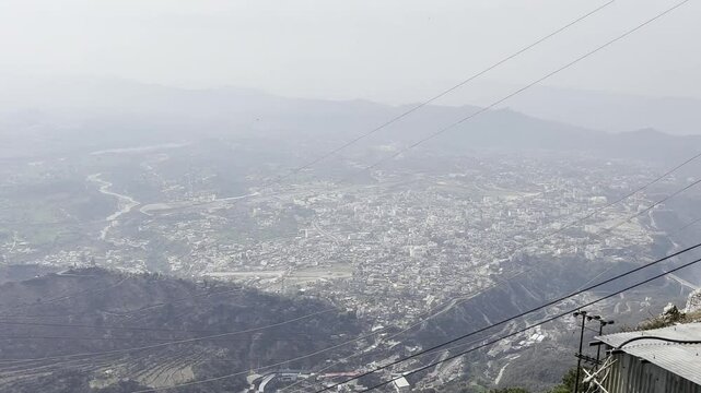 Cinematic footage capturing the spiritual journey and vibrant atmosphere of the Vaishno Devi pilgrimage in Katra, nestled in the scenic Trikuta Mountains of Jammu and Kashmir.