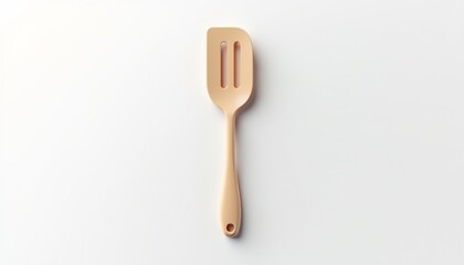 Minimalist silicone spatula in soft peach tone for cooking preparation on white