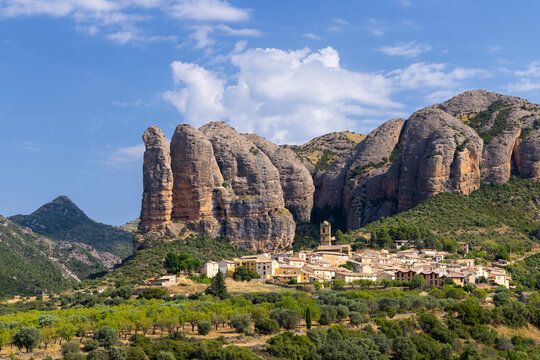 Aguero village nestled amidst Mallos de Riglos rock formations in Huesca, Spain