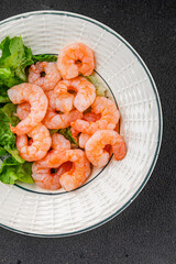 Shrimp salad prawns seafood fresh pescetarian diet gourmet food background on the table rustic food top view copy space keto and paleo diet vegetarian food
