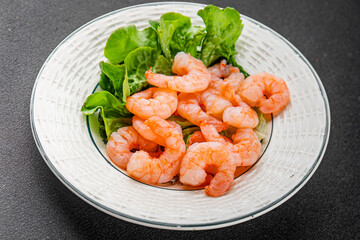 Shrimp salad prawns seafood fresh pescetarian diet gourmet food background on the table rustic food top view copy space keto and paleo diet vegetarian food