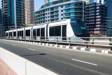 Futuristic Driverless Tram Gliding Through the City Streets - A Vision of Modern Urban Transport.