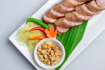 Traditional Thai Northern Style Grilled Sausage (Sai Ua) with Condiments