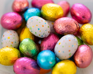 assorted colourful Easter Eggs wrapped in foil
