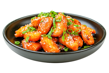 Delicious sesame chicken dish in black bowl isolated on transparent PNG