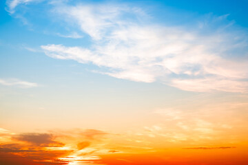 Beautiful , luxury soft gradient orange gold clouds and sunlight on the blue sky perfect for the background, take in evening,Twilight, Large size, high definition landscape photo