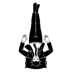 Silhouette of a Businessman Relaxing Upside Down in a Suit