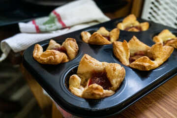 Sugar Plum Cheese Danish. Puff pastry with plum jam and cinnamon. Dessert. Food