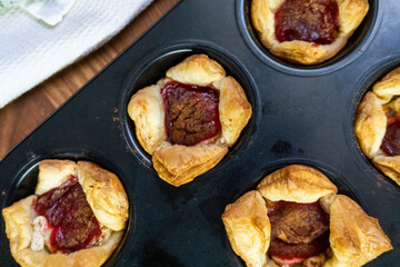 Sugar Plum Cheese Danish. Puff pastry with plum jam and cinnamon. Dessert. Food
