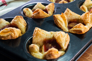 Sugar Plum Cheese Danish. Puff pastry with plum jam and cinnamon. Dessert. Food
