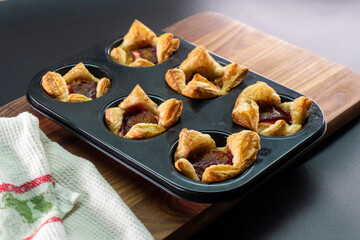 Sugar Plum Cheese Danish. Puff pastry with plum jam and cinnamon. Dessert. Food
