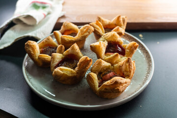 Sugar Plum Cheese Danish. Puff pastry with plum jam and cinnamon. Dessert. Food