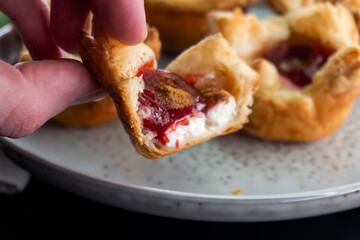 Sugar Plum Cheese Danish. Puff pastry with plum jam and cinnamon. Dessert. Food