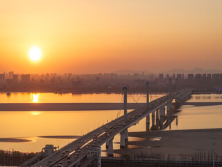 Fototapeta premium aerial view bridge during sunset