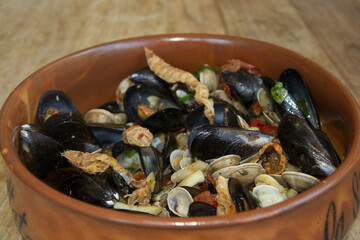 Seafood Medley in Rustic Clay Bowl