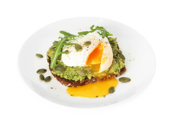 Delicious sandwich with avocado, poached egg, arugula and pumpkin seeds isolated on white