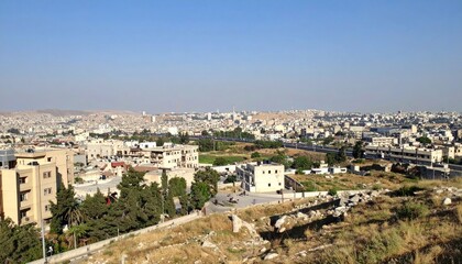 Panoramic view of Amman's urban landscape, showcasing the city's architecture