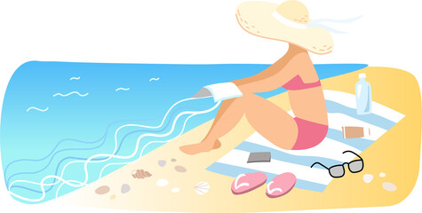 Woman sunbathing on the beach