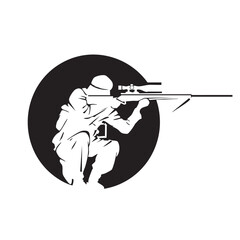 Military sniper aiming from a crouched position at night