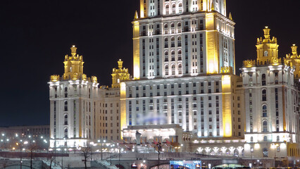 Hotel Ukraine winter night timelapse hyperlapse with bridge over Moscow River.