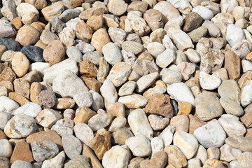 Colorful decorative river stones in natural light