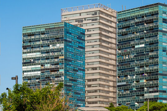 Glass and steel buildings in Barcelona with reflections and geometric patterns creating a contemporary urban aesthetic
