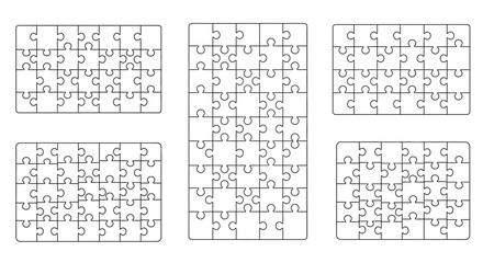 Collection of different jigsaw puzzle arrangements isolated on white background
