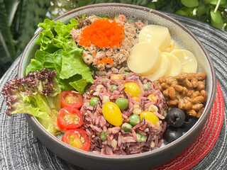 Stir-Fried Brown Rice with Green Peas and Ginkgo Nuts, Served with Tuna, Tobiko, Japanese Egg Tofu, Natto, and Fresh Salad
