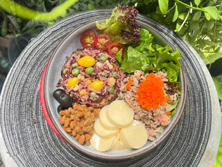 Stir-Fried Brown Rice with Green Peas and Ginkgo Nuts, Served with Tuna, Tobiko, Japanese Egg Tofu, Natto, and Fresh Salad