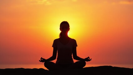 Serene Woman Silhouetted Against Vibrant Sunset Meditating by Ocean