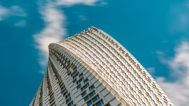 Cayan Tower timelapse known also as Infinity Tower in Dubai Marina.