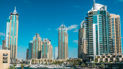 Naklejka premium Dubai Marina modern towers in Dubai at day time timelapse