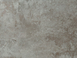 Detailed close-up of a grey-brown glazed tile featuring a realistic aged stone or concrete texture with subtle variations and marks, perfect for backgrounds