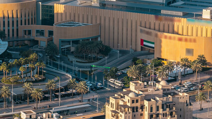 Top view of mall entrance and parking area timelapse.