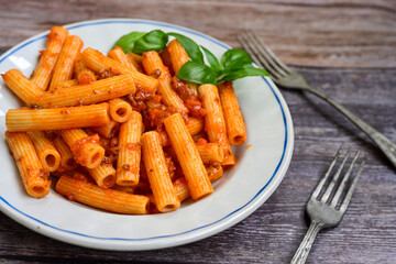  Pasta bolognese .Italian home made meal Fresh   maccheroni pasta with tomato sauce, basil, herbs ,parmesan cheese ,fresh cherry tomatoes and parsley on wooden background. Kitchen Poster 